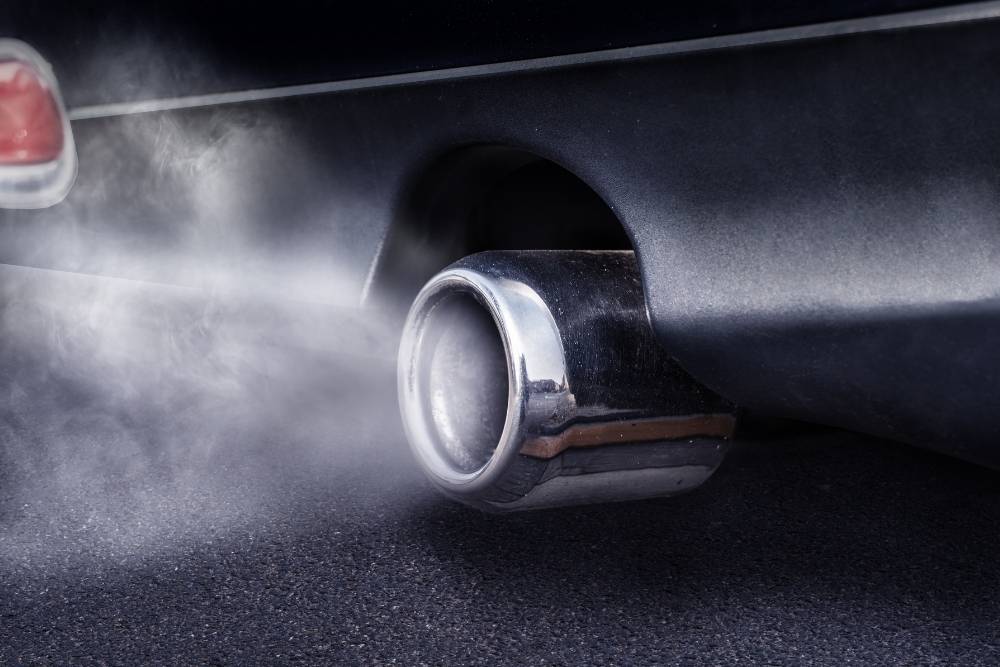 your engine has a serious fluid leak if it is producing a ton of exhaust